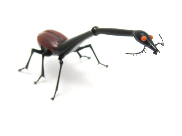 Giraffe Weevil, glass bug by Wesley Fleming